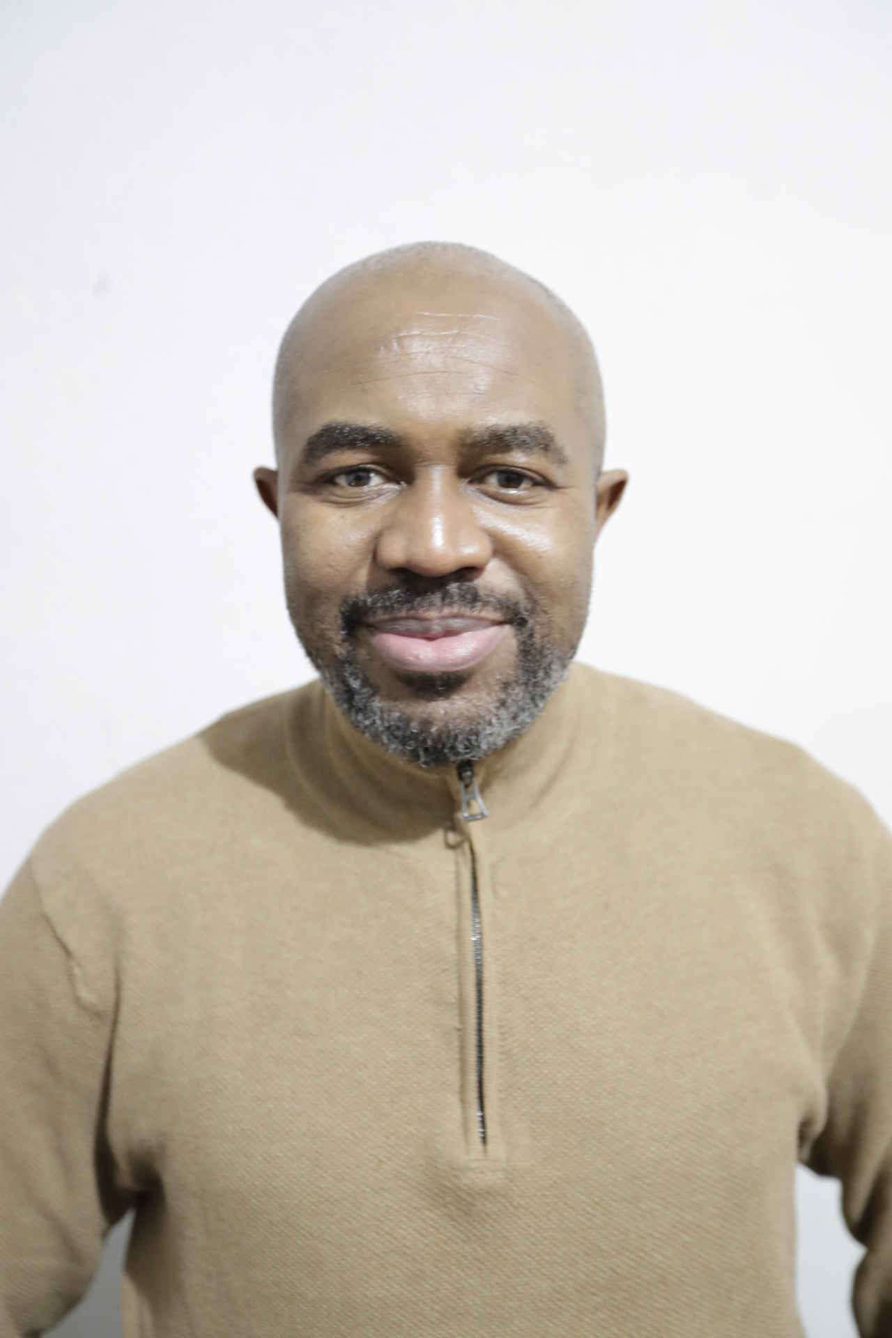 Portrait of D. Kuetche, Communications Director of PMSA