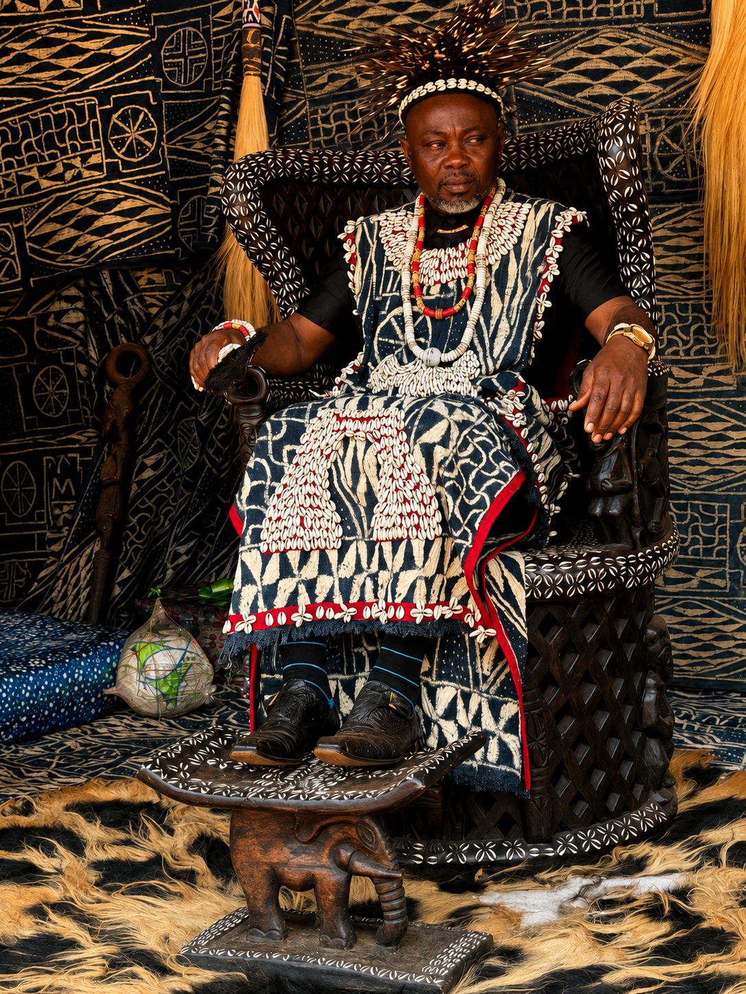 His Majesty Fô Tàkûkǎm Jean-Raymond, King of Baméka, in royal ndop attire