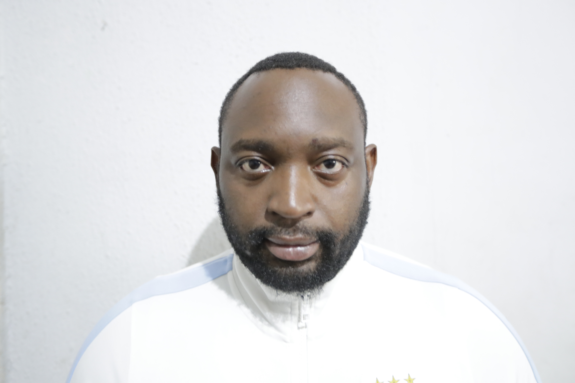 Portrait of J. Oumbe, Secretary General of PMSA